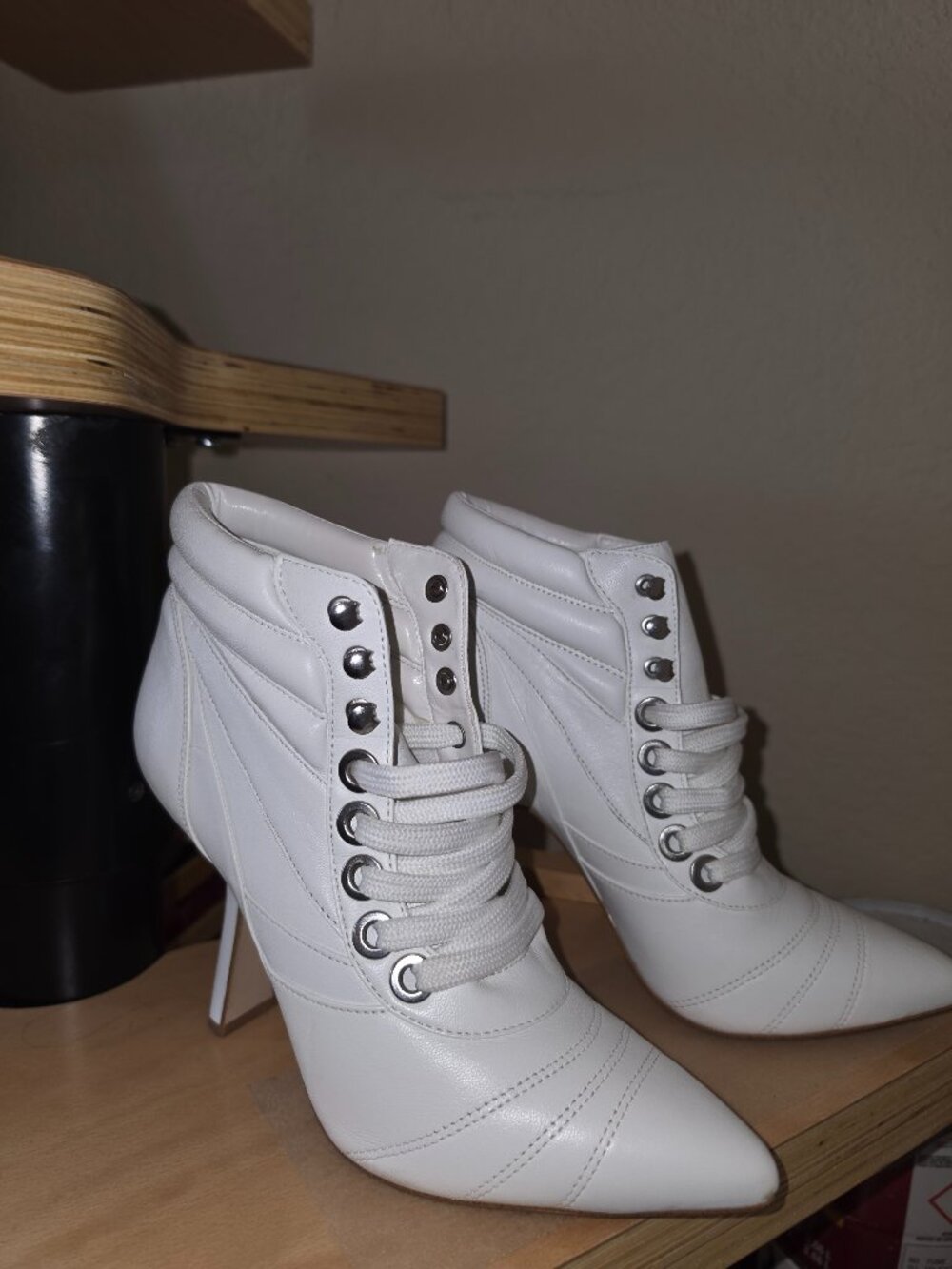 White Gianni Bini booties.